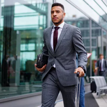 The leather pouch black and grey Louis Vuitton Corentin Tolisso on his account Instagram @corentintolisso