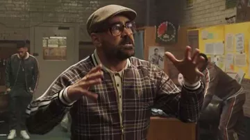 The grey cap worn by Coach (Colin Farrell) in The Traveling