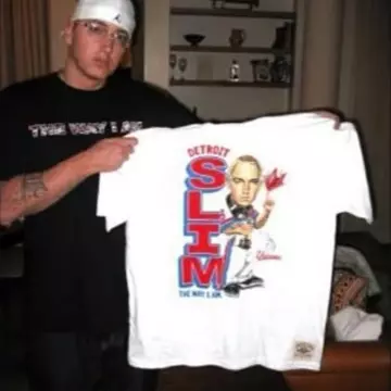 UNDRCRWN Detroit Slim T-shirt held by Eminem in old picture