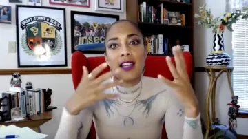 Marine serre Tat­too Print Mock Neck Top worn by Amanda Seales on The Real May 1, 2020