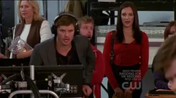 The cardigan red Anthropologie worn by Millicent 'Millie' Huxtable (Lisa Goldstein) in The Brothers Scott (S08E14)