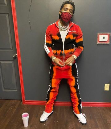 Palm Angels tie-dye Print Track Jack­et worn by YFN Lucci on his Instagram account @yfnlucci