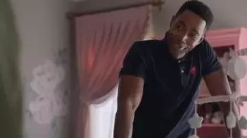 Navy Po­lo worn by Lawrence Walker (Jay Ellis) in Insecure Season 4 Episode 4