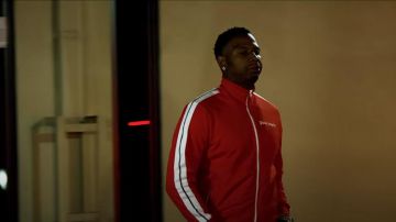 Palm Angels Lo­go Print Track Jack­et worn by Moneybagg Yo in Spin On Em (Official Music Video) feat. Fredo Bang