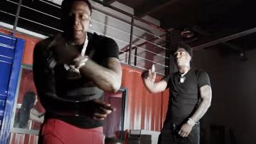 Palm Angels Red Clas­sic Track Pants worn by Moneybagg Yo in Spin On Em (Official Music Video) feat. Fredo Bang