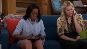 Pleat­ed Back Striped Shirt worn by Tina (Tichina Arnold) in The Neighborhood Season 2 Episode 22