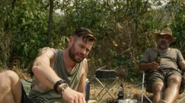 Olive tank top worn by Tyler Rake (Chris Hemsworth) in Extraction