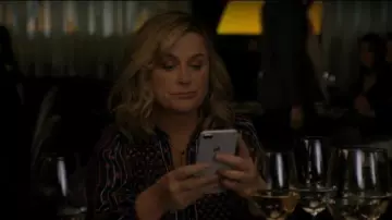 Apple iPhone used by Abby (Amy Poehler) in Wine Country