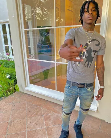 Zapatillas Nike Jordan 4 Retro Black Cat usadas por Polo G en su cuenta de Instagram @polo.capalot