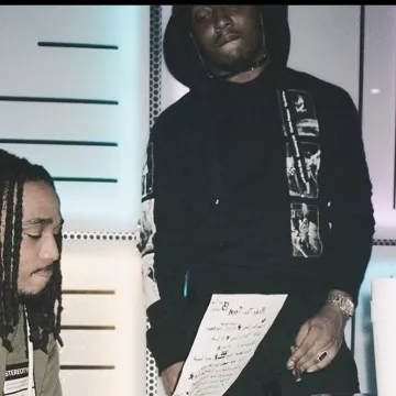 Maison Margiela Stereo­type Hood­ie Olive Green worn by Quavo on his Instagram account @quavohuncho