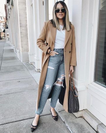 Bolso negro Goyard de Ashley Robertson en la cuenta de Instagram @ashleyrobertson