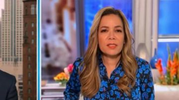 Equipment Leema Flo­ral Satin But­ton-Down Shirt worn by Sunny Hostin on The View May 14, 2020