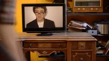 The suit jacket black Thomas Gauthier in the video I love tv!