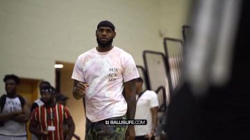 Lebron James wears Sun Sun Sun t-shirt by Sasquatchfabrix. dunking before Bronny's championship game on July 2019!