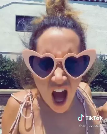 Storycoast Heart Sun­glass­es worn by Ashley Tisdale Tiktok May 17, 2020