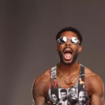 Black lense with gold outline sunglasses worn by Montez Ford on his In­sta­gram Ac­count @Mon­tez­ford­wwe