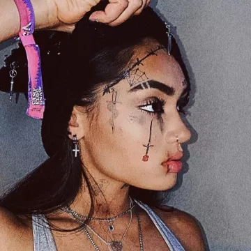 The grey tank top worn by Avani Gregg on his account Instagram @avani 