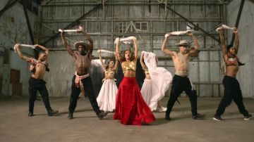 The red skirt long-range Isabela Merced in her music video PAPI