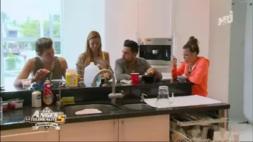 The orange vest hoody worn by Capucine Anav in The Angels of reality tv 5