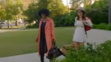 Orange long trench worn by Taylor Harding (Kirby Howell-Baptiste) in Why Women Kill (S01E07)