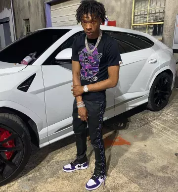 Les sneakers Nike Jordan 1 Retro High Court Purple White de Lil Baby sur son compte Instagram @lilbaby_1