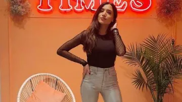 Black Dot Bodysuit Top usado por Nicole Lopez-Alvar en The Bachelor Temporada 24