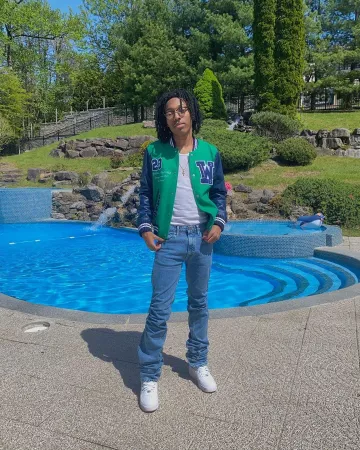 The jacket in green and blue with Off-White Lil Tecca on his account Instagram @liltecca