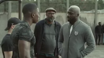 The tracksuit jacket grey zipped Richard Valentine range by Mastar (Moussa Mansaly) in Validated (S01E07)