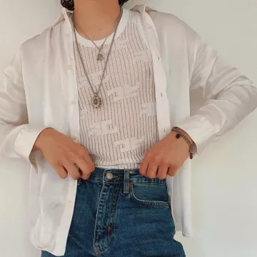 Le débardeur Courrèges porté par Sulivan Gwed sur son compte Instagram @sulivangwed 