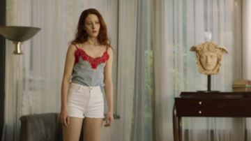 Cami top trimmed with red lace worn by Adriana Clios (Roxane Duran) in Riviera (S02E05)