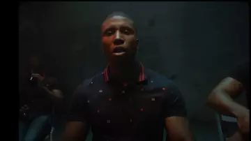 The polo Gucci with embroidered detail worn by Bosh in her video clip Lonely