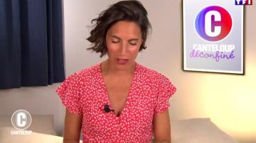 The red dress short sleeves floating,fabric-covered buttons of Alessandra Sublet's in It is Canteloup the 03.06.2020