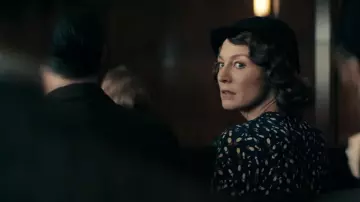 Printed blue dress worn by the Stenographer (Heather Shields) in Perry Mason Official Trailer 2 (Season 1)