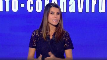 The dress lace cut slim fit with belt to tie and short sleeves worn by Karine Ferri in the Draw for the lotto