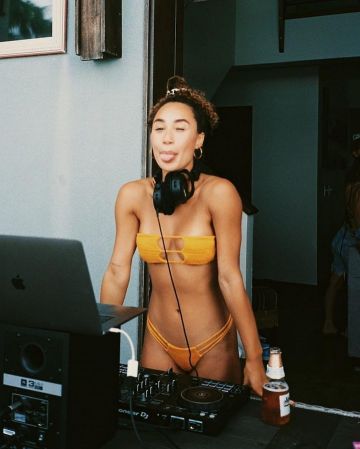 Mustard yellow strap bikini top worn by Eva Gutowski on her Instagram account @mylifeaseva
