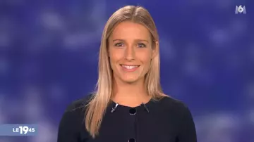 The vest runs right buttoned navy of Florence Trainar in The 19:45