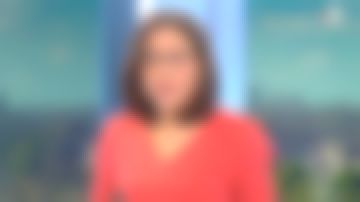 The printed dress V-neck and 3/4 sleeves smockées of Karine Baste-Regis in Télématin