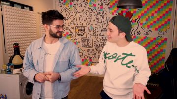 The sweatshirt Lacoste signature carried by HugoPosay in the YouTube video the ONE WHO LOSES WILL be HATED... with @FastGoodCuisine