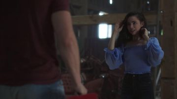 The top blue puffed sleeves ASTR The Label of April Dibrina (Sofia Carson) in the film Feel the Beat