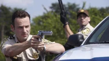 The badge "King County," Rick Grimes (Andrew Lincoln) in The Walking Dead (S01E01)