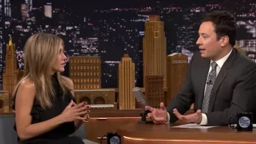 Coat, smooth black with ruffles worn by Jennifer Aniston on The Tonight Show Starring Jimmy Fallon 