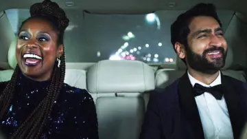 The smoking jacket purple worn by Jibran (Kumail Nanjiani) in The Love Birds