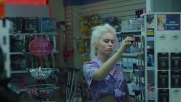 The purple shirt pink with small flowers over Milla (Eliza Scanlen) in the film Milla