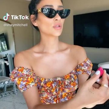 Floral off shoulder dress worn by Shay Mitchell on TikTok