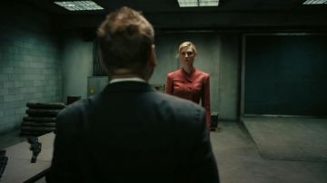 Red suit worn by Elizabeth Debicki as seen in Tenet