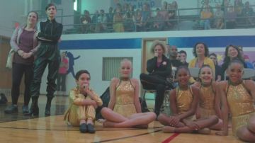 The black pants with sequins worn by April (Sofia Carson) in Feel the Beat