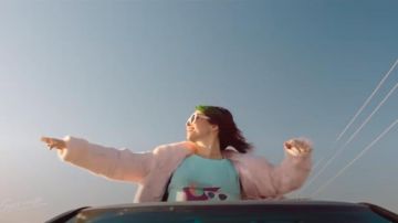 Pink Faux Fur Coat worn by Sarah (Cristin Milioti) in Palm Springs