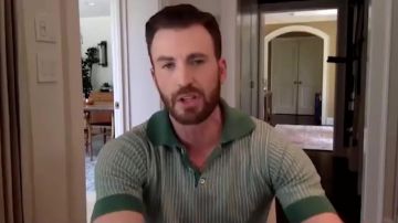 Far Afield Green and white striped polo shirt worn by Chris Evans in Late Night With Seth Meyers appearance.