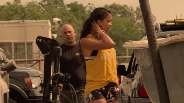 Black striped bikini top worn by Kiara (Madison Bailey) in Outer Banks (S01E03)