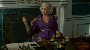 The blazer uniform purple worn by The Handler (Kate Walsh) in the series Umbrella Academy (Season 2)